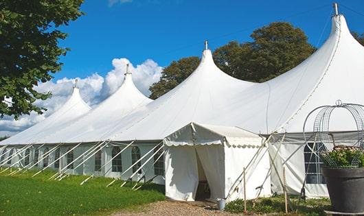 high-quality porta potties stationed at a wedding, meeting the needs of guests throughout the outdoor reception in Union Mills, IN